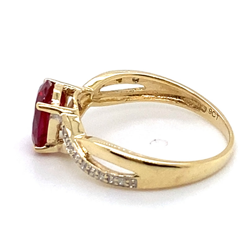 9CT YELLOW GOLD SYNTHETIC RUBY & DIAMONDS SET IN CROSSOVER PATTERN RING