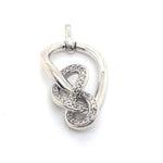 DIAMONDS SET IN IN SILVER KNOT STYLE PENDANT