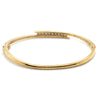 9CT YELLOW GOLD HINGED OVAL CROSS OVER PATTERNED BANGLE VALUED @ $3498