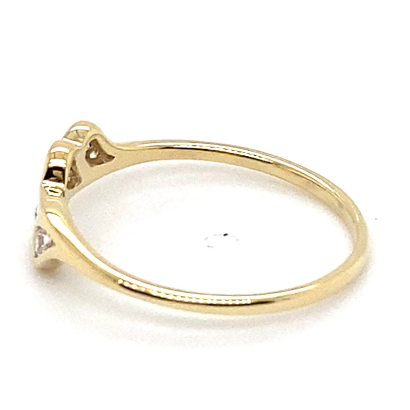 9CT YELLOW GOLD CUBIC ZIRCONIAS CHANNEL SET IN THE CROSS OVER RING