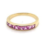9CT YELLOW GOLD CHANNEL SET SYNTHETIC PINK SAPPHIRES DRESS RING