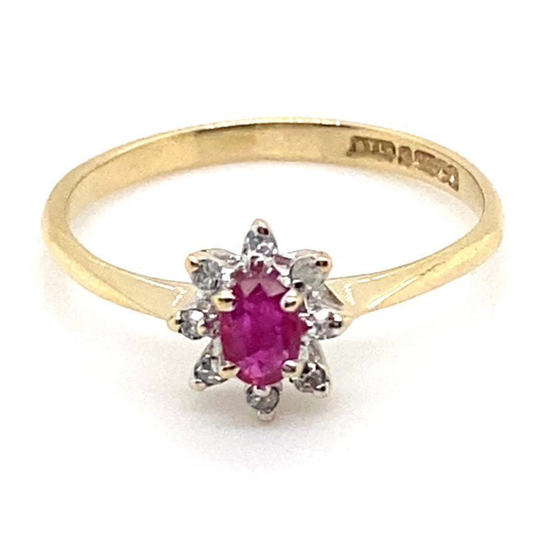 9CT YELLOW GOLD NATURAL RUBY SURROUNDED BY  DIAMONDS DRESS RING
