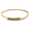 9CT YELLOW GOLD HINGED OVAL CROSS OVER PATTERNED BANGLE VALUED @ $3498