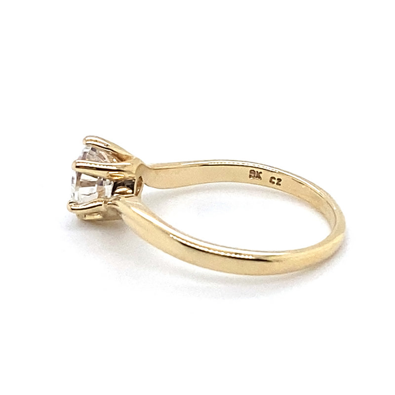 9CT YELLOW GOLD CUBIC ZIRCONIA SET IN RAISED SETTING DRESS RING