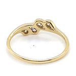 9CT YELLOW GOLD CUBIC ZIRCONIAS CHANNEL SET IN THE CROSS OVER RING