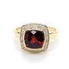 9CT YELLOW GOLD GARNET BEZEL SET SURROUNDED BY DIAMONDS DRESS RING