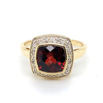 9CT YELLOW GOLD GARNET BEZEL SET SURROUNDED BY DIAMONDS DRESS RING