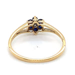 9CT YELLOW GOLD DIAMOND SURROUNDED BY SAPPHIRES IN CLUSTER SETTING DRESS RING