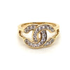 9CT YELLOW GOLD CUBIC ZIRCONIAS SET IN CROSS OVER C PATTERN RING
