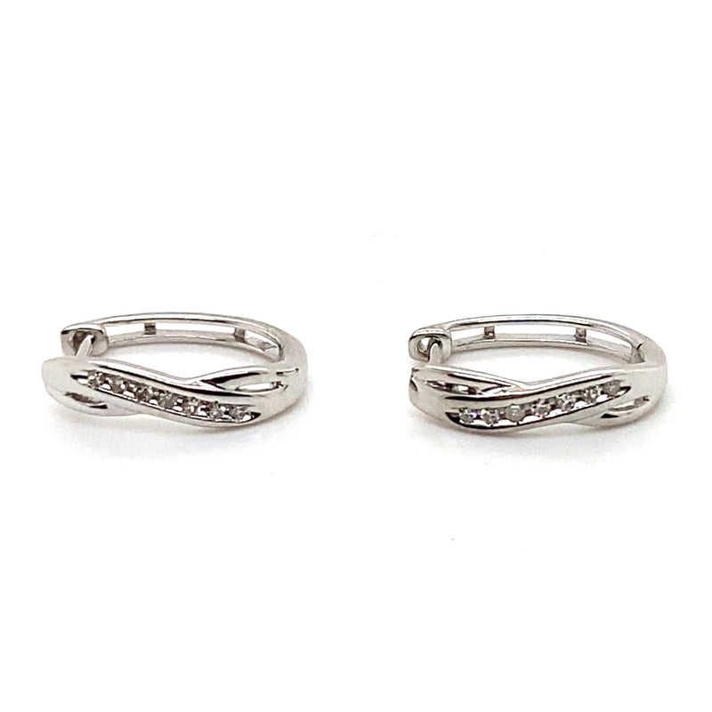 9CT WHITE GOLD DIAMONDS SET IN THE FRONT CROSS OVER HUGGIE STYLE EARRINGS
