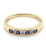 10CT YELLOW GOLD CHANNEL SET SYNTHETIC SAPPHIRE & DIAMOND RING