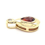 9CT YELLOW GOLD DIAMOND & PEAR CUT GARNET PENDANT TW 1.1g