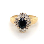 9CT YELLOW GOLD BLUE/BLACK SAPPHIRE SURROUNDED BY DIAMONDS DRESS RING