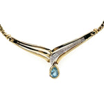 9CT YELLOW GOLD FLAT DOUBLE CURB CHAIN WITH DIAMOND & TOPAZ IN "V" SHAPE