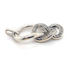 DIAMONDS SET IN IN SILVER KNOT STYLE PENDANT