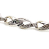 9CT WHITE GOLD DIAMONDS SET IN CROSS OVER LINKS 16CM BRACELET