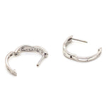 9CT WHITE GOLD DIAMONDS SET IN THE FRONT CROSS OVER HUGGIE STYLE EARRINGS