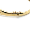 9CT YELLOW GOLD DIAMOND CROSSOVER PATTERN HINGED BANGLE VALUED @ $3499