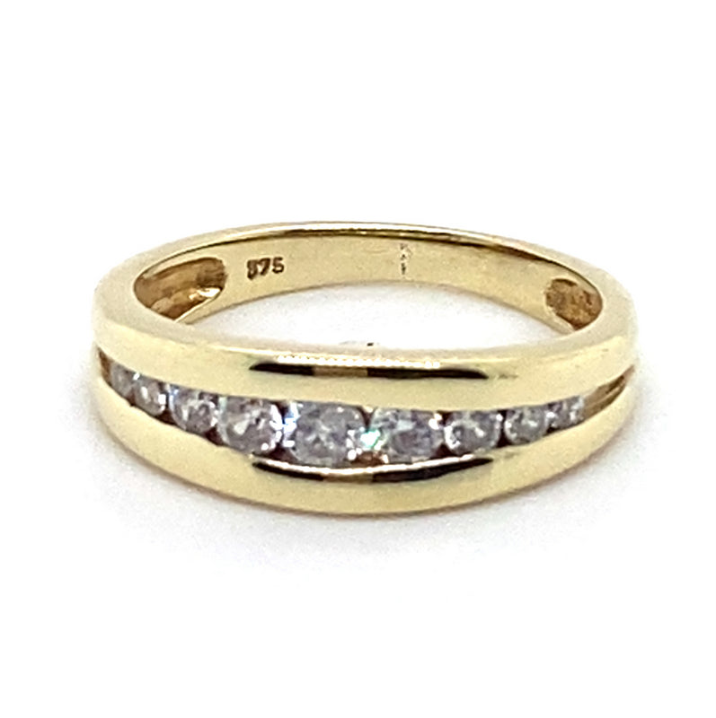 9CT YELLOW GOLD CUBIC ZIRCONIAS CHANNEL SET IN THICKENED TOP DRESS RING