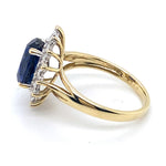 9CT YELLOW GOLD SYNTHETIC SAPPHIRE SURROUNDED BY DIAMONDS DRESS RING