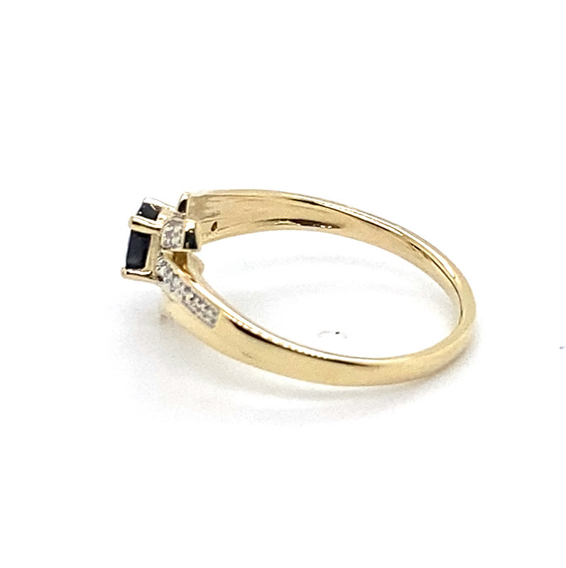 9CT YELLOW GOLD DIAMOND & SAPPHIRE SET IN CROSS OVER SHOULDER DRESS RING