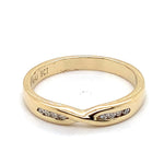 9CT YELLOW GOLD CHANNEL SET DIAMONDS IN CROSS OVER PATTERN DRESS RING