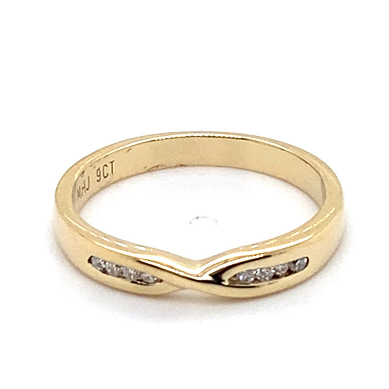 9CT YELLOW GOLD CHANNEL SET DIAMONDS IN CROSS OVER PATTERN DRESS RING