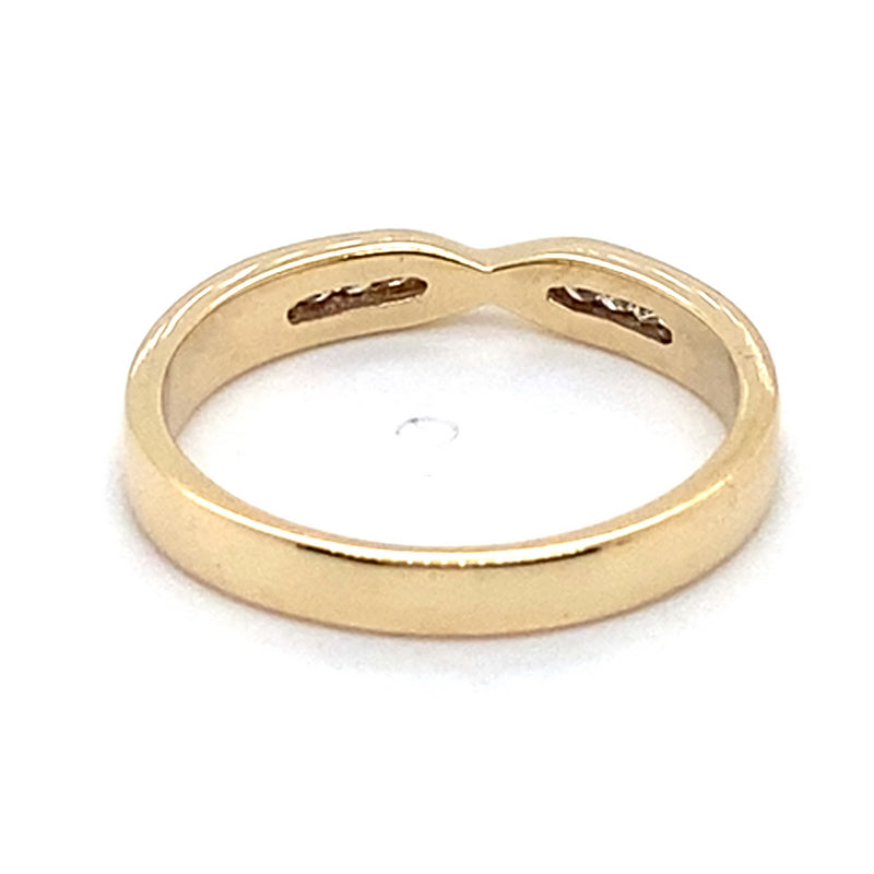 9CT YELLOW GOLD CHANNEL SET DIAMONDS IN CROSS OVER PATTERN DRESS RING