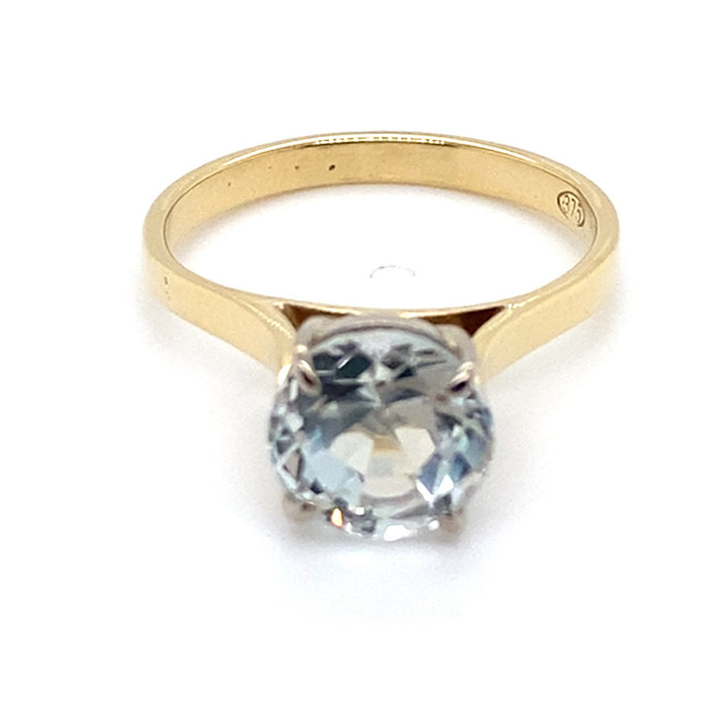 9CT YELLOW & WHITE GOLD TOPAZ SET IN RAISED SETTING DRESS RING