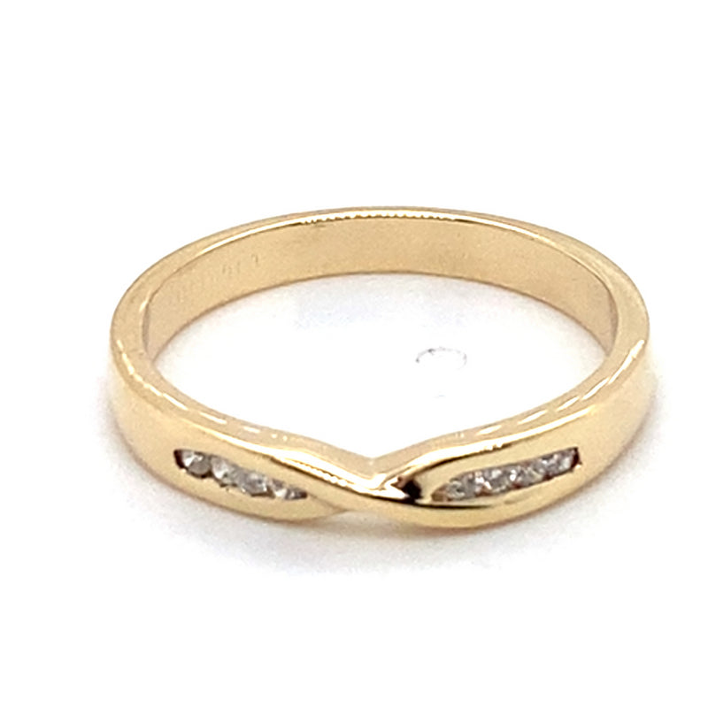 9CT YELLOW GOLD CHANNEL SET DIAMONDS IN CROSS OVER PATTERN DRESS RING