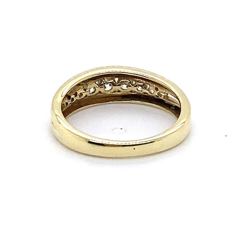 9CT YELLOW GOLD CUBIC ZIRCONIAS CHANNEL SET IN THICKENED TOP DRESS RING
