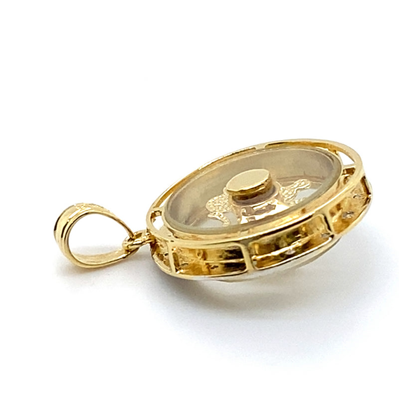 18CT YELLOW GOLD DIAMONDS SET IN ROUND PENDANT WITH ENCASED SPINNER ELEPHANT
