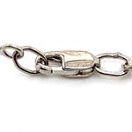 9CT WHITE GOLD DIAMONDS SET IN CROSS OVER LINKS 16CM BRACELET