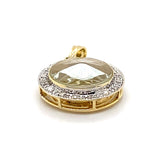 18CT YELLOW GOLD DIAMONDS SET IN ROUND PENDANT WITH ENCASED SPINNER ELEPHANT