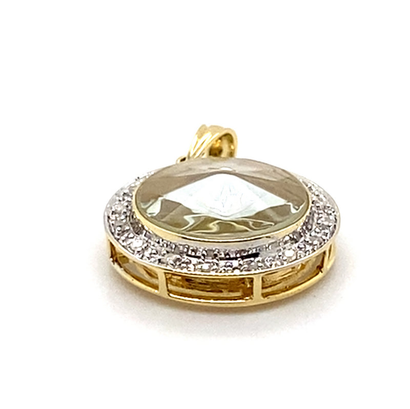 18CT YELLOW GOLD DIAMONDS SET IN ROUND PENDANT WITH ENCASED SPINNER ELEPHANT