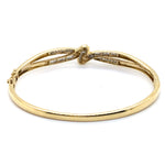 9CT YELLOW GOLD DIAMOND CROSSOVER PATTERN HINGED BANGLE VALUED @ $3499