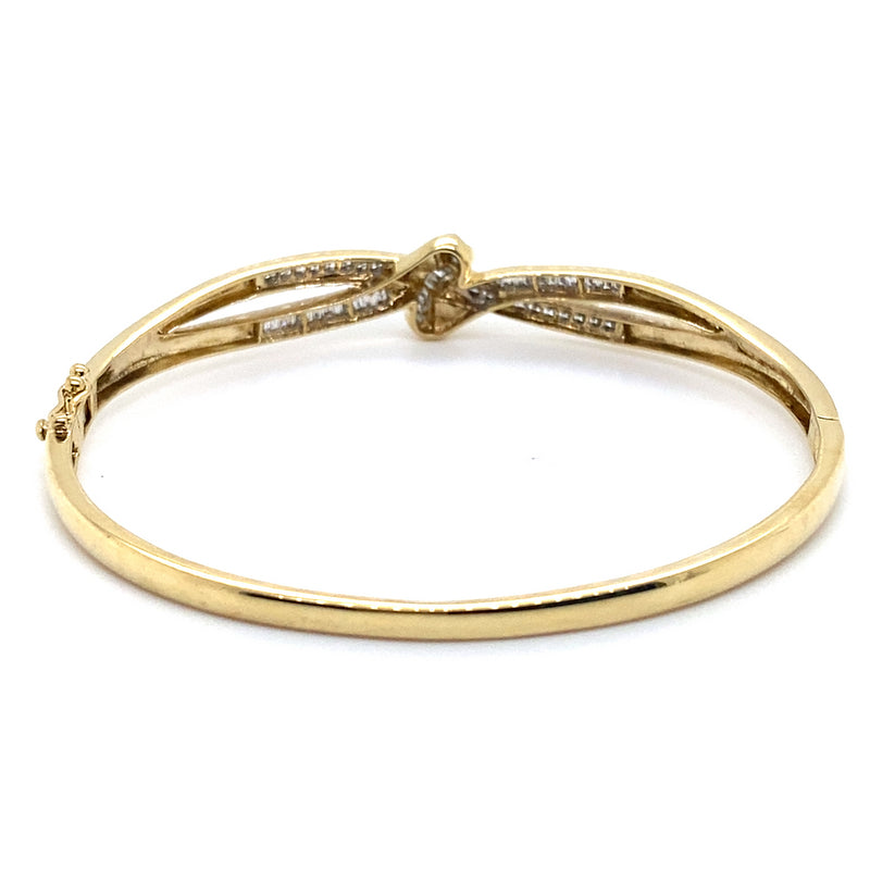 9CT YELLOW GOLD DIAMOND CROSSOVER PATTERN HINGED BANGLE VALUED @ $3499
