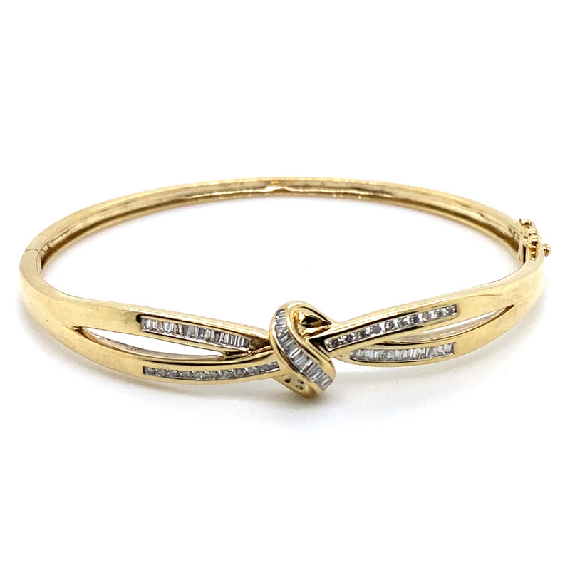 9CT YELLOW GOLD DIAMOND CROSSOVER PATTERN HINGED BANGLE VALUED @ $3499