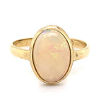 9CT YELLOW GOLD OVAL CABOCHON CUT OPAL DRESS RING VALUED @ $1899
