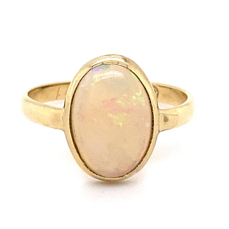 9CT YELLOW GOLD OVAL CABOCHON CUT OPAL DRESS RING VALUED @ $1899