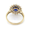9CT YELLOW GOLD SYNTHETIC SAPPHIRE SURROUNDED BY DIAMONDS DRESS RING