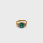 9CT YELLOW GOLD POINTED SHOULDER EMERALD & DIAMOND DRESS RING VALUED @ $1299